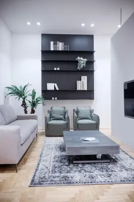 a living room with two couches and a coffee table at Palazzo Giglio suite in Palermo