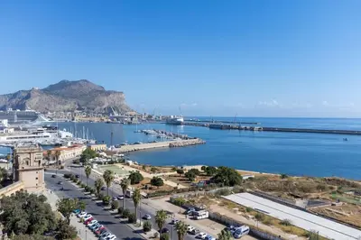 an aerial view of a harbor with a marina at Trinacria Luxury Suite in Palermo