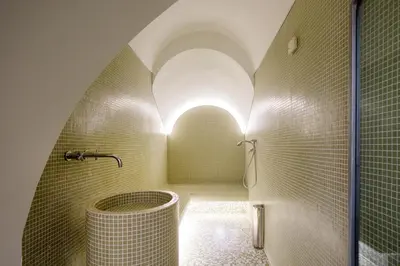 a bathroom with a shower and a tub at Trinacria Luxury Suite in Palermo
