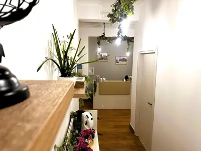 a kitchen with a box of flowers on the counter at Ai Papiri in Palermo