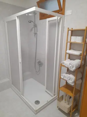 a shower with a glass door in a bathroom at casa vacanza tobruk in Castellammare del Golfo