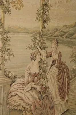 a painting of two women sitting next to the water at Al Palazzo Del Principe al Massimo in Palermo