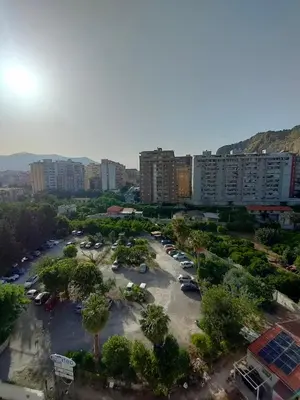 an aerial view of a parking lot in a city at D'Amelio Sweet Home in Palermo