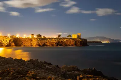 a view of a body of water at night at Casa vacanze green house in Terrasini
