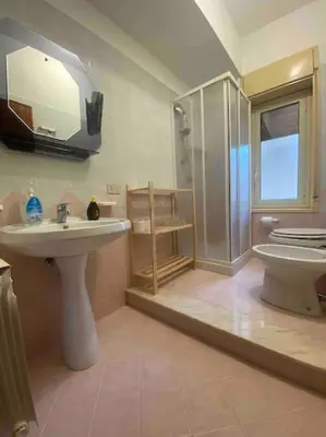 a bathroom with a sink and a shower and a toilet at Nonna Giovanna in Castellammare del Golfo