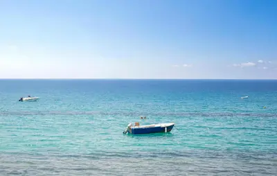 a boat in the middle of a large body of water at Cozy Home In Partinico in Partinico