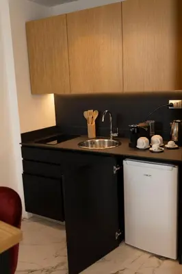 a kitchen with a sink and a counter top at La Dimora dei Paladini in Bagheria