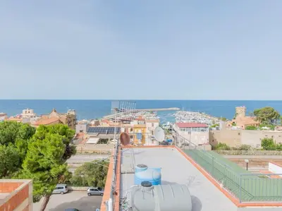 a view of a city from the roof of a building at Casa Vacanze Ginevra in Mandra Capreria