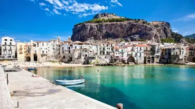 a bedroom with a white dresser and a window at Sicily Apartment 4 - BLUE WAVES in Campofelice di Roccella