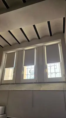 three windows in a room with white walls at Da Lila a Ballarò in Palermo