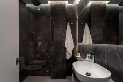 a bathroom with a sink and a shower at Cilea Apartments in Palermo