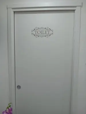 a glass door with a sign on it at Pietro Fudduni Apartment in Palermo
