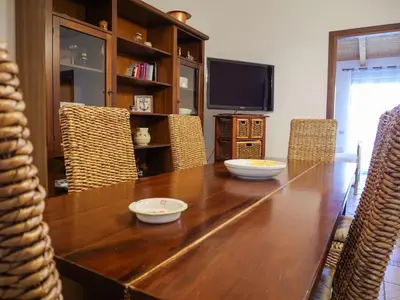 a wooden table with two bowls on top of it at Casa del pescatore - fronte mare di Mondello - By Rentalbeb italy- in Palermo