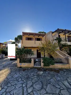 a building sitting on top of a stone road at Triskelia in San Vito lo Capo