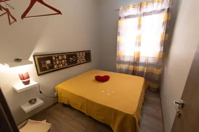 a room with a table with a heart on it at Stella Maris Case Vacanze in Balestrate