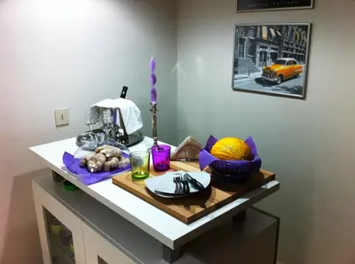 a table with a cutting board with food on it at Stella Maris Case Vacanze in Balestrate