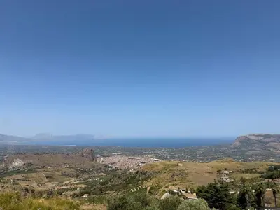 a view of the ocean from the top of a hill at Villa Shanti a Romitello - 