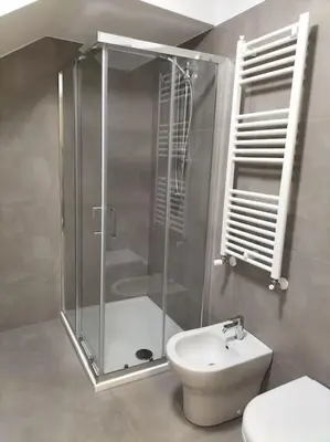 a bathroom with a shower and a toilet and a sink at Casa vacanze LoRiLù in Castellammare del Golfo