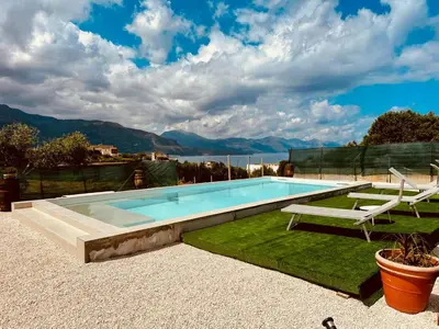 a swimming pool with a view of the water at Casa Sole eventi, Wi-Fi, fronte Mare con piscina in Alcamo
