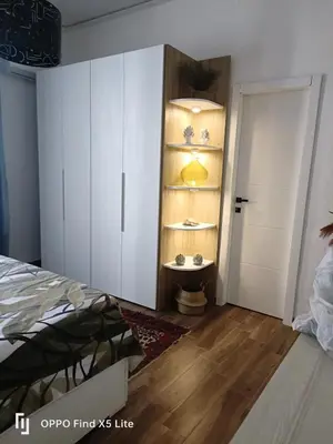 a bedroom with a bed and a table in a room at Suite 374 in Palermo