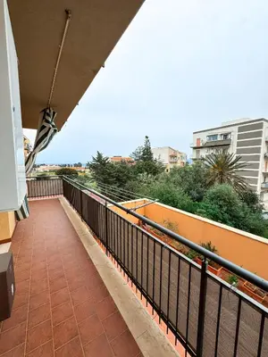a balcony with a fence and a walkway at Appartamento Trinacria in Castellammare del Golfo