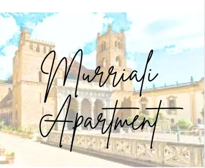 a picture of a castle with the words merida enchantment at Murriali Apartment in Monreale