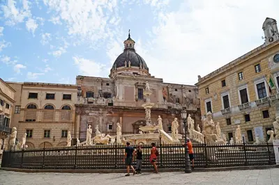 a group of people standing in front of a building at Quattro Canti 200 mt- Appartamento Salvia in Palermo
