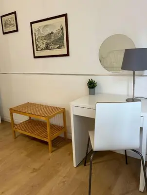 a room with a desk and a table and a chair at Villa Marea Mondello in Palermo