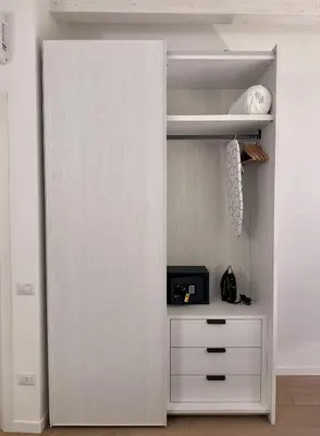 a closet with a white door and a drawer at Nika Palermo Holiday House in Palermo