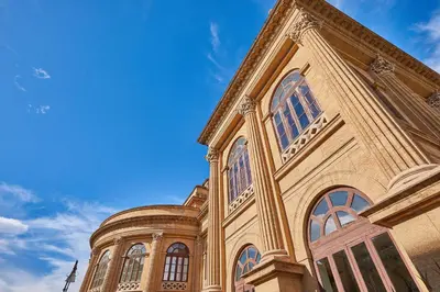 a building with many windows on the side of it at Zia Marì Casa Vacanze in Palermo