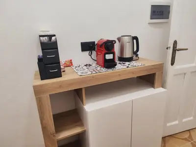 a table with a coffee maker on it in a kitchen at Casa Donna Caterina e Don Paolo in Bagheria