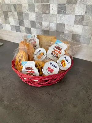 a basket filled with different types of food at La Dolce Vita in Campofelice di Roccella