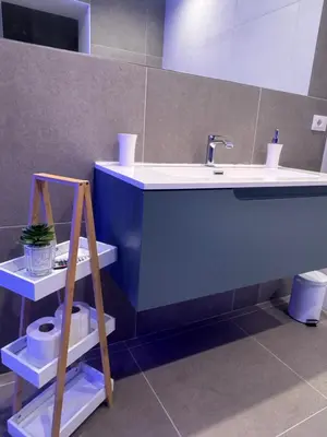 a bathroom with a sink and a toilet at Luxury Rooms Soraja in Palermo