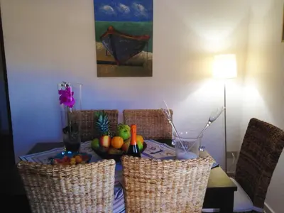a table with a bowl of fruit on top of it at Il Casale San Vito in San Vito lo Capo