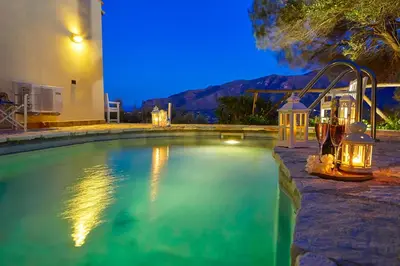 a swimming pool with a slide in a house at Villa Rosa Dei Venti - Scopello-Villas in Scopello