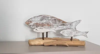 a bird sculpture sitting on top of a table at Senza Pensieri Holiday Home in Balestrate