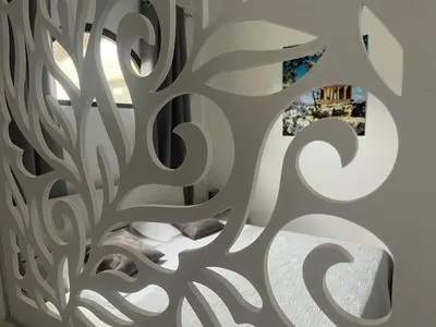 a wall mural with a tree pattern on it at Villa Nunziatella Badia in Trappeto
