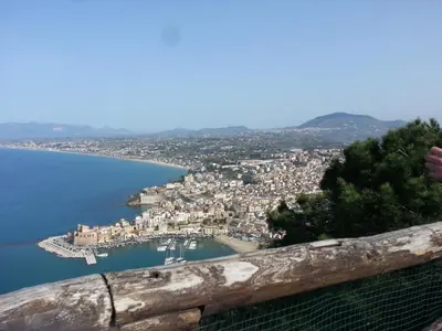 a view of a city from a hill with a harbor at Blunda Holiday Home in Castellammare del Golfo