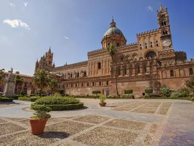a large building with a clock tower on top of it at Holiday Home Maya's Home Palermo by Interhome in Palermo