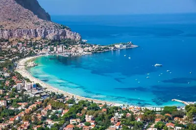 an aerial view of a beach in the amalfi coast at Il Cavaliere Apartment in Capaci