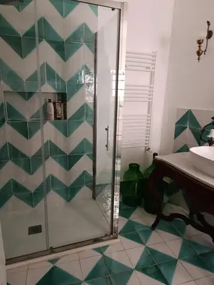 a bathroom with a shower and a sink at La dimora del MARCHESE NOTARBARTOLO in Palermo