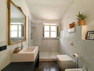 a bathroom with a sink and a tub and a toilet at Centro storico-Marina Free Parking, Wifi,Netflix in Palermo