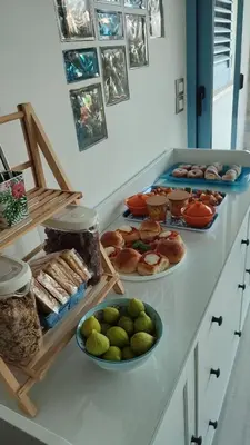 a counter with several plates of food on it at Tramonti d'Alba in Terrasini