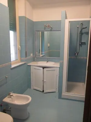 a bathroom with a sink and a toilet and a shower at Panormus Home&Apartaments in Palermo