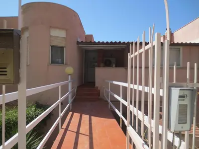 a balcony of a house with a fence at Casa Allegra Mondello in Palermo