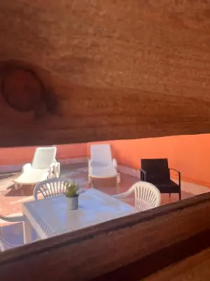 a view of a room with chairs and a table at Casa Vacanze Filippa in Balestrate