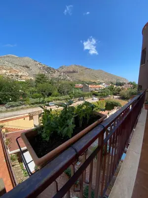a balcony with a view of a city at La Bella Vista in Palermo
