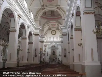 a large cathedral with a church with a cross at Casa Vacanze Kristel in Balestrate