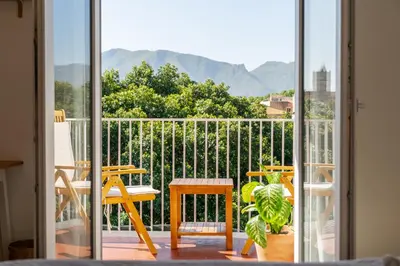 a view of a balcony with a table and chairs at Stefy's Home #Cattedrale in Palermo
