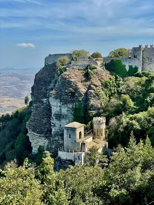 a castle on the side of a mountain at ViLoKa Sicilian Guest House in Calatafimi